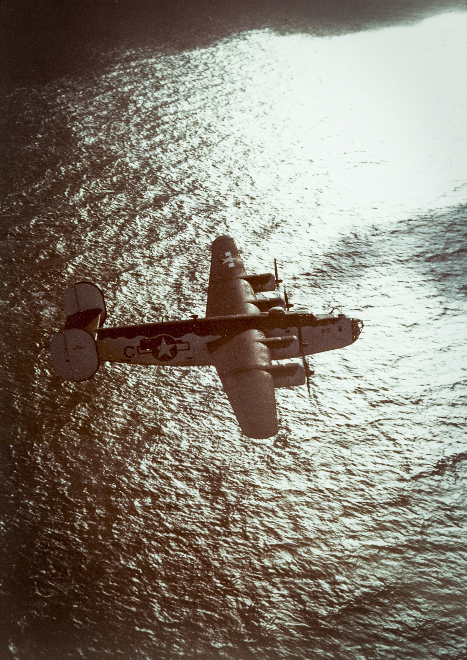 US Navy Consolidated PB4Y-1 Liberator heads out over the Bay of Biscay on an anti submarine patrol summer 1943 K13687