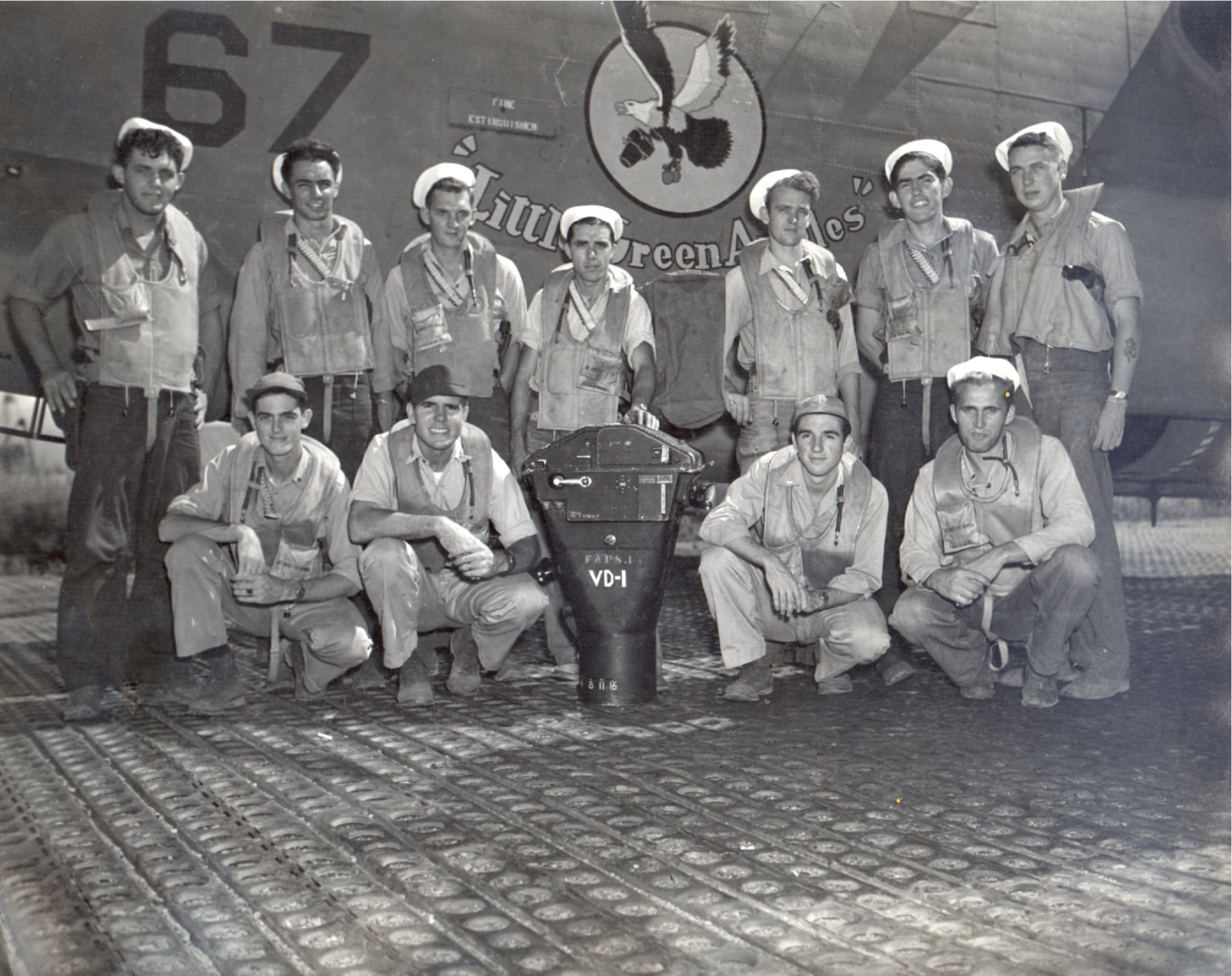 US Navy Consolidated PB4Y-1P Liberator crew their aircraft named Little Green Apples 01
