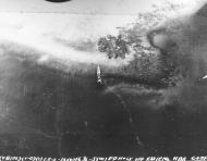 Asisbiz US Navy VB-106 PB4Y-1 Liberators over fly a wrecked Japanese Destroyer off New Ireland New Britain 1943 44 NH 75361