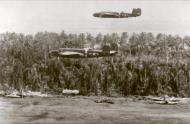 Asisbiz 41 30075 B 25D Mitchell 5AF 345BG500BS Air Apaches Lil De Icer over Boram airfield Wewak New Guinea 4th Jan 1944 01