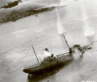 Asisbiz 5AF 345BG B 25's sink a Japanese freighter the bow and ofrecastle submerged South China Sea 1st Mar 1945 01