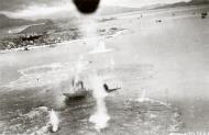 Asisbiz 5AF 345BG B 25's sink a Japanese freighter the bow and ofrecastle submerged South China Sea 1st Mar 1945 02