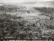 Asisbiz B 25 Mitchell 5AF 345BG499BS attacking Boram airfield Wewak New Guinea 16th Oct 1943 01