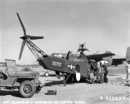 Asisbiz 41 12492 B 25C Mitchell 10AF gives shade as crew assemble a new helicopterat Singkalling Burma 23rd Jan 1945 NA015