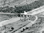 Asisbiz Target 10AF B 25 Mitchell's hit the Mu River bridge with 1,000lb bomb Nyaungbinwun Burma 1945 NA629