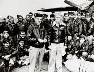 Asisbiz LtCol Jimmy Doolittle accepts a medal from the skipper of the USS Hornet Capt Marc A Mitscher NH64472