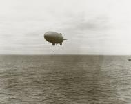 Asisbiz Navy blimp L 8 approaches USS Hornet (CV 8) to deliver parts for the mission's B 25B aircraft NH53288