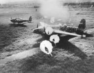 Asisbiz B 25 Mitchells 5AF Para Bomb Aparri Airdrome Luzon Philippines 22nd Feb 1945 NAID 342 FH 001338