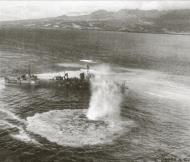 Asisbiz Raid on Cape Gloucester New Briatin score a direct hit on a Japanese Destroyer 28th Jul 1943 05
