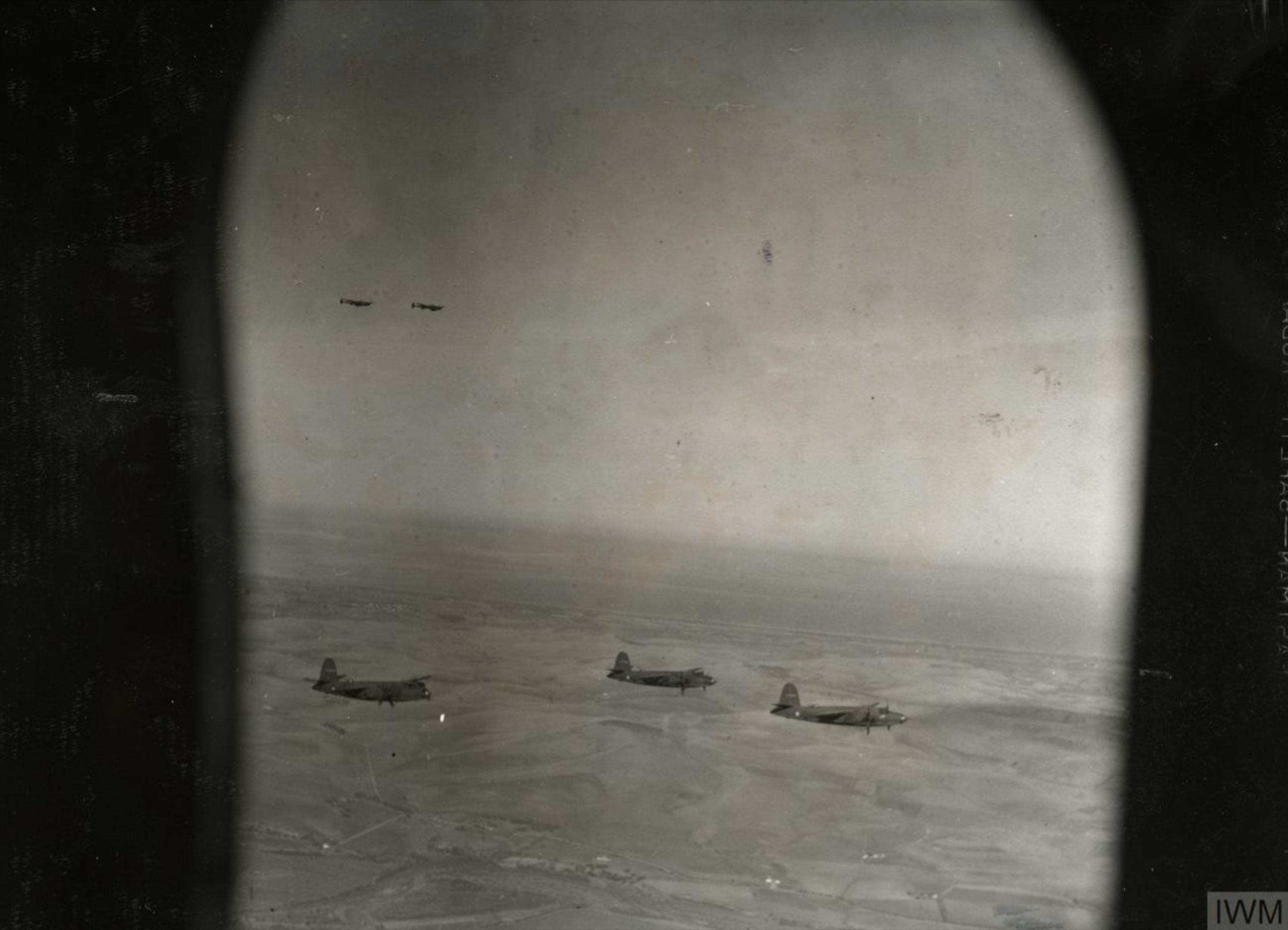 41 17803 B 26B Marauder 12AF 319BG438BS (R) in flight during a raid over Bizerte Tunisia 4 Dec 1942 FRE11646