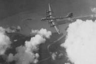 Asisbiz Boeing B-29 Superfortress 20AF J2 in flight with engine damage over Burma 02