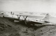 Asisbiz 44 69703 Boeing B-29 Superfortress 20AF 19BG30BS A landed at Iwo Jima due to battle damage over Tokyo 10th Mar 1945 01