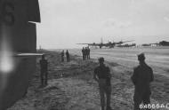 Asisbiz Boeing B-29 Superfortress 20AF 9BG1BS with one engine feathered lands at Iwo Jima after a raid on Tokyo 10th Mar 1945 01