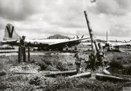 Asisbiz Boeing B-29 Superfortress 20AF V54 foreground with a Japanese anti aircraft gun at Saipan FRE11914