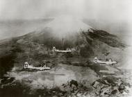 Asisbiz Boeing B-29 Superfortresses 20AF 19BG in flight over Fujiyama Japan FRE11933