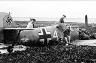 Asisbiz Messerschmitt Bf 109E3 White 4 force landed frence beach 01