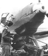 Asisbiz Messerschmitt Bf 109E3B armors loading a 250kg Bomb 1940 01