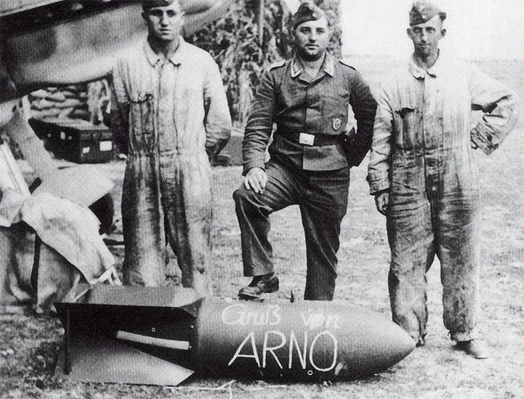 Aircrew Luftwaffe ground grew from Erprobungsgruppe 210 pose with a SC250 bomb France 1940 01