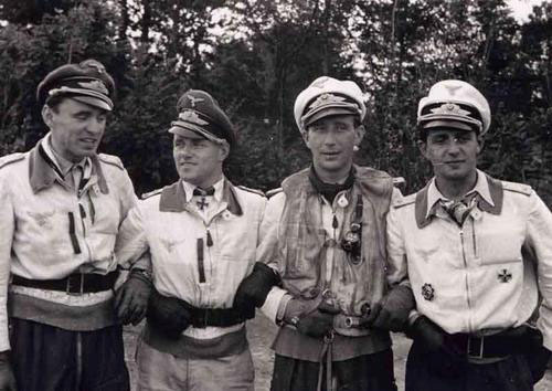 Aircrew Luftwaffe JG26 ace pilot and ex Olympian Joachim Muncheberg with flying comrades 02