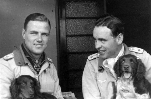 Aircrew Luftwaffe JG26 ace pilot and ex Olympian Joachim Muncheberg with his best friend 02