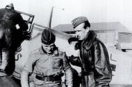 Asisbiz Aircrew Luftwaffe JG26 ace pilot and ex Olympian Joachim Muncheberg being briefed 01