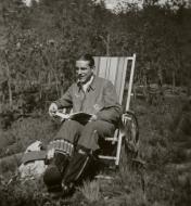 Asisbiz Aircrew Luftwaffe JG26 pilot on standbye reads a book to relax eBay 01