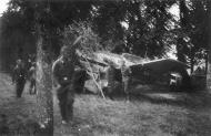 Asisbiz Messerschmitt Bf 109E JG26 camouflaged under French hedgerows 1940 web 01