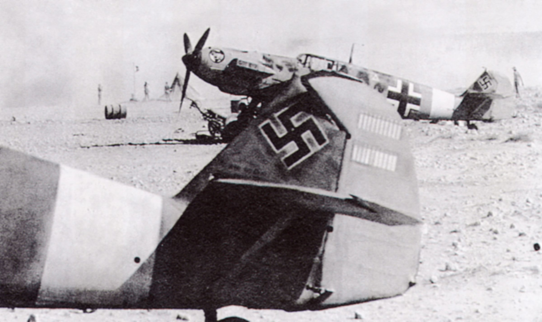 Messerschmitt Bf 109E7Trop 2.JG27 Black 1 Fritz Keller background North Africa 1941 03