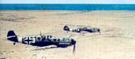 Asisbiz Messerschmitt Bf 109E7Trop 1.JG27 White 3 and 8 on low level patrol over Libya Feb 1942 02