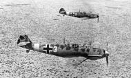 Asisbiz Messerschmitt Bf 109E7Trop 1.JG27 White 3 and 8 on low level patrol over Libya Feb 1942 06