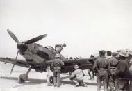 Asisbiz Messerschmitt Bf 109E7Trop JG27 pilot being greeted back from a sortie North Africa 1941 01