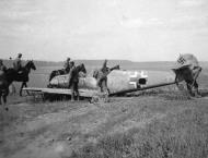 Asisbiz Ostfront Messerschmitt Bf 109E7B 8.JG27 Black 12 with yellow band belly landed Minsk Belarus Russia Aug 1941 02
