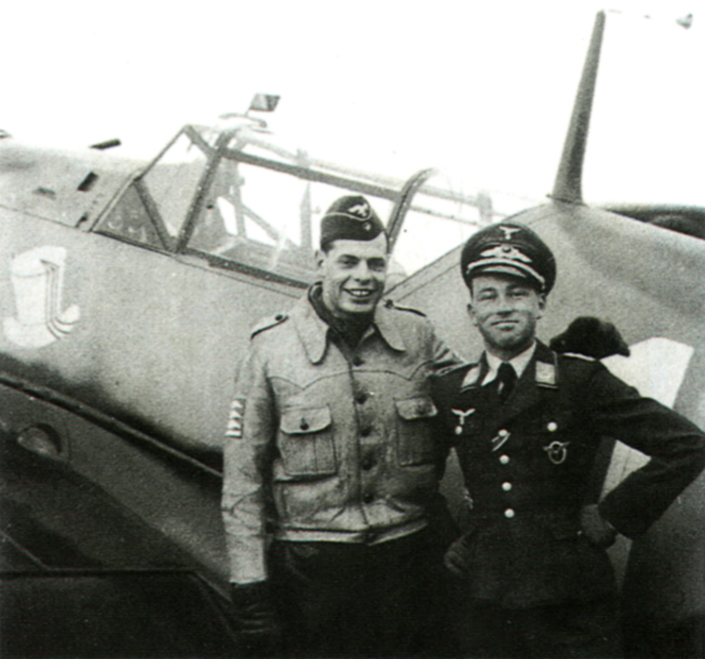 Aircrew Hubert Kroeck congratulates Douglas Pitcairn from 1.JG51 on his first victory 25th Sep 1939 01