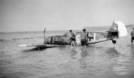 Asisbiz Messerschmitt Bf 109E1 7.JG53 White 9 after a belly landing on a Beach 1940 01