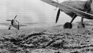 Asisbiz Messerschmitt Bf 109E 8.JG77 Black 11 in the background France Jan 1941 01