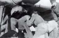 Asisbiz Messerschmitt Bf 109E4B 1.(J)LG2 loading ordinance SC 50 bombs France 1940 03