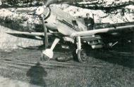 Asisbiz Messerschmitt Bf 109E4B 6.(S)LG2 under camouflage netting France 1940 0A