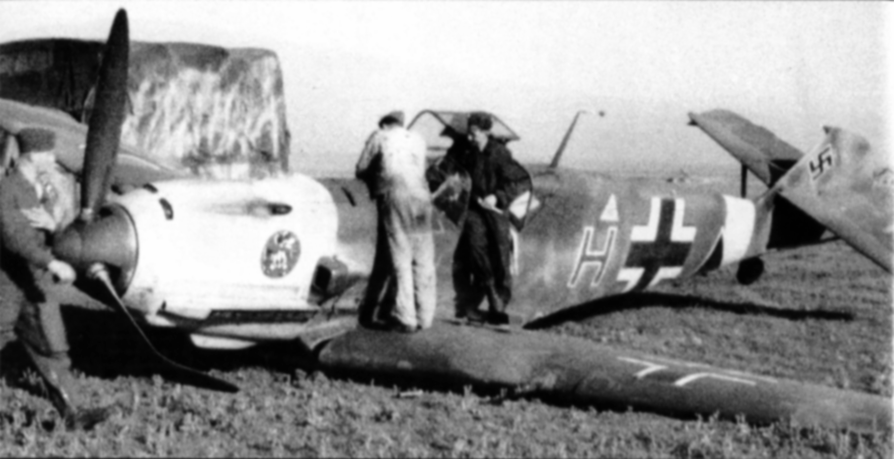 Messerschmitt Bf 109E3B 5.SchG1 Blue H Triangle belly landed 01