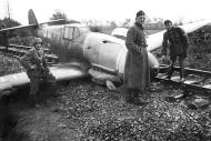 Asisbiz Messerschmitt Bf 109F Black 14 belly landed on a railway track 01