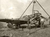 Asisbiz Messerschmitt Bf 109F being salvaged by a Luftwaffe retrieval team 01
