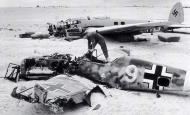 Asisbiz North Africa Messerschmitt Bf 109F4Trop Yellow 9 abandoned at El Dabaa Egypt Nov 1942 01