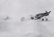 Asisbiz Ostfront Luftwaffe II Gruppe Bf 109Fs grounded due to zero visibility conditions during the Russian winter of 1941 42 01