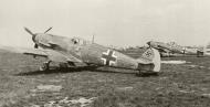 Asisbiz Messerschmitt Bf 109F2B 10.JG2(Jabo) Blue 10 back ground Beaumont le Roger France 1942 01