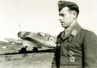 Asisbiz Aircrew Luftwaffe pilot Heinrich Ehrler poses in front of Bf 109F4 4.JG5 (W9+ ) Petsamo Finland 1942 01