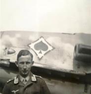 Asisbiz Aircrew Luftwaffe pilot JG53 Wilhelm Manz poses with Bf 109 ebay1