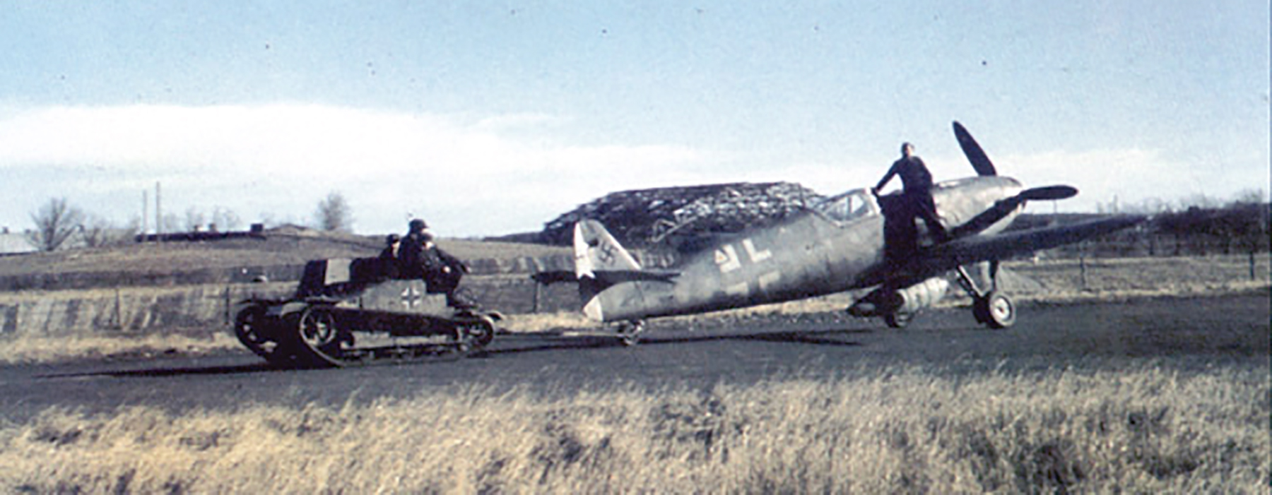 Messerschmitt Bf 109G14 Erla being towed towards the runway area Germany 1945 01