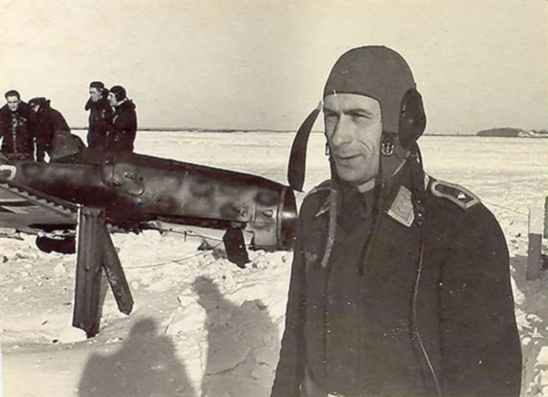 Messerschmitt Bf 109G5 White 3 after a landing mishap and unknown Goofy looking pilot 01