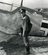 Asisbiz Aircrew Luftwaffe JG52 ace Walter Krupinski climbing into a Bf 109E1 01