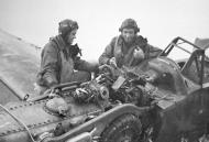 Asisbiz Messerschmitt Bf 109G14AS Erla Reichsverteidigung unknown unit and pilot geing inspected by USAAF pilots 01