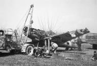 Asisbiz Messerschmitt Bf 109G6 partial Stammkennzeichen Stkz xx+Dx being salvaged unknown unit 01